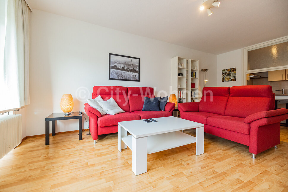 Furnished apartment with two balconies and underground parking space in