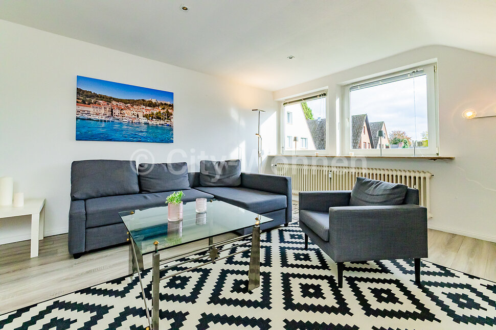 Modern furnished attic apartment in quiet and green location in HamburgMeiendorf CityWohnen